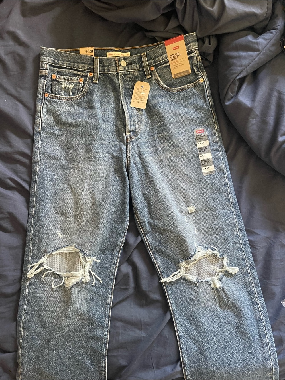 Levi's Women’s Light Blue Distressed Straight Jeans